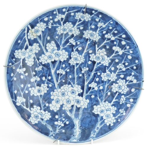 43 - A Chinese blue and white porcelain prunus charger, early 19th century, 36cm in diameter.