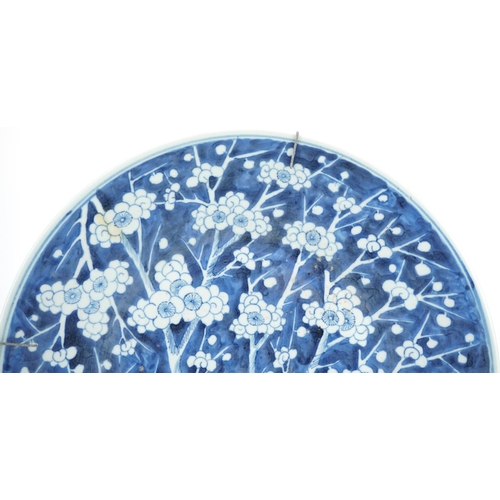  A Chinese blue and white porcelain prunus charger, early 19th century, 36cm in diameter.