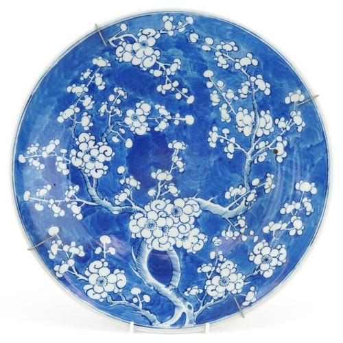 42 - A Chinese blue and white porcelain prunus charger, early 19th century, 38cm in diameter.