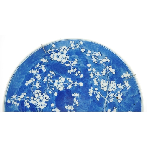  A Chinese blue and white porcelain prunus charger, early 19th century, 38cm in diameter.