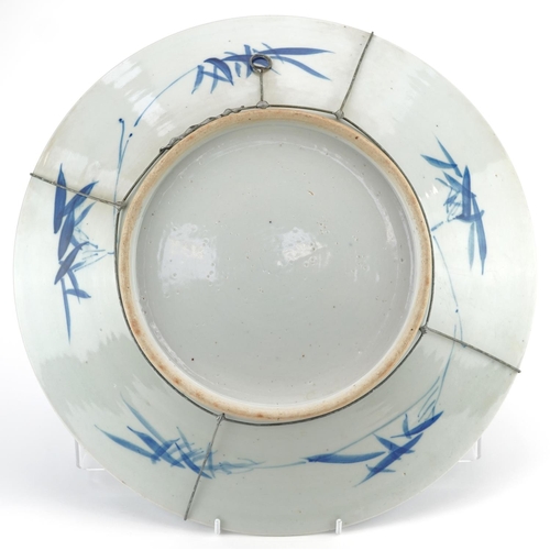 42 - A Chinese blue and white porcelain prunus charger, early 19th century, 38cm in diameter.