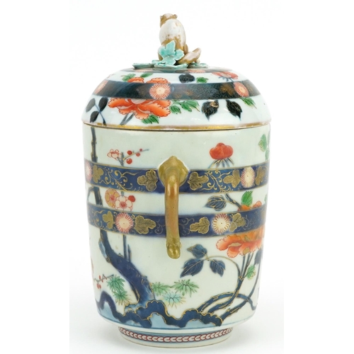 152A - A Japanese Imari porcelain lidded jar, Meiji period, the lid mounted with a rat, 23cm high x 13cm in... 