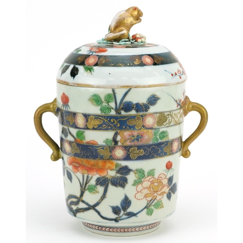 152A - A Japanese Imari porcelain lidded jar, Meiji period, the lid mounted with a rat, 23cm high x 13cm in... 