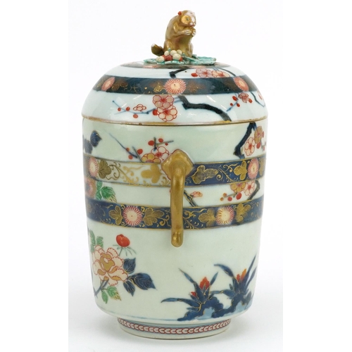 152A - A Japanese Imari porcelain lidded jar, Meiji period, the lid mounted with a rat, 23cm high x 13cm in... 