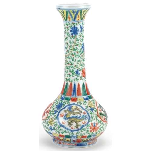 248 - A Chinese wucai porcelain bottle vase, 20th century, decorated with dragons, bearing six figure char... 