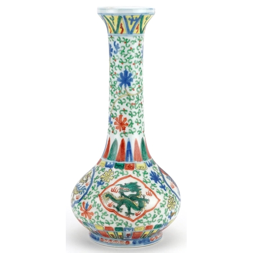 248 - A Chinese wucai porcelain bottle vase, 20th century, decorated with dragons, bearing six figure char... 