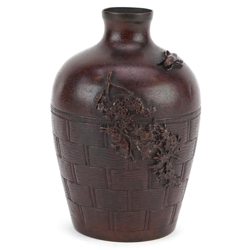 101 - A Japanese bronze diminutive vase, 20th century, decorated in the form of a wall with a branch and i... 