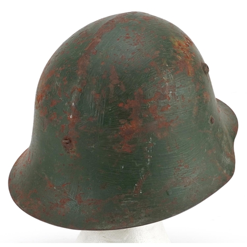 2600 - A Romanian military interest tin helmet with liner.