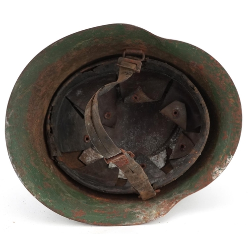 2600 - A Romanian military interest tin helmet with liner.