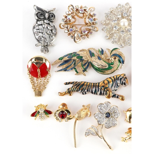 3327 - A collection of vintage and later brooches including a Christopher Radko enamelled soldier, jewelled... 