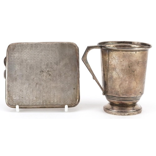 423 - Rectangular silver engine turned cigarette case by Joseph Gloster and a silver christening tankard, ... 