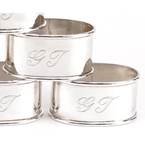 466 - A set of six Mexican oval silver napkin rings, 5cm wide, total 100.2g.