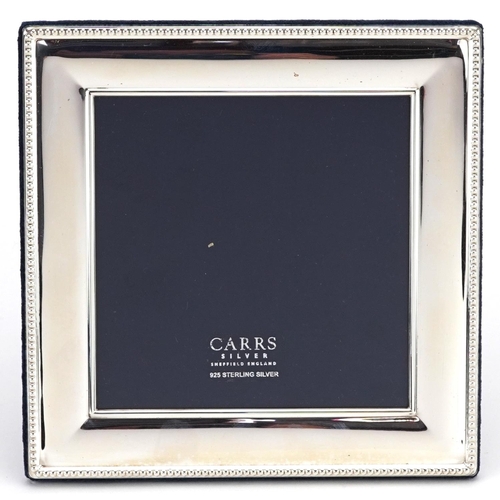 585 - Carrs, square silver easel photo frame with box, Sheffield 2004, 17.5cm x 17.5cm.