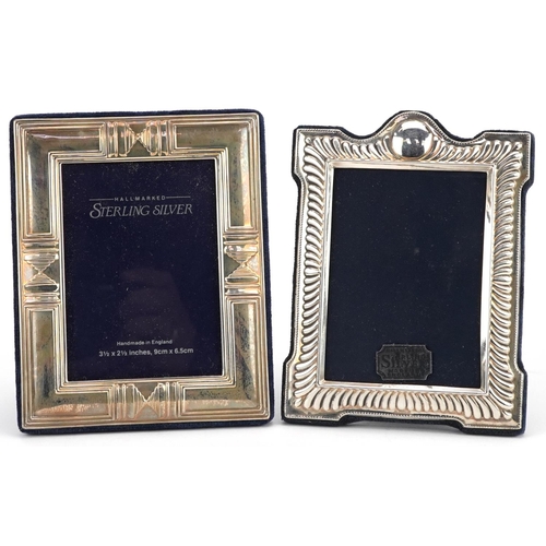 601 - Carrs, two rectangular embossed silver easel photo frames with boxes, Sheffield 1990 and 1991, the l... 