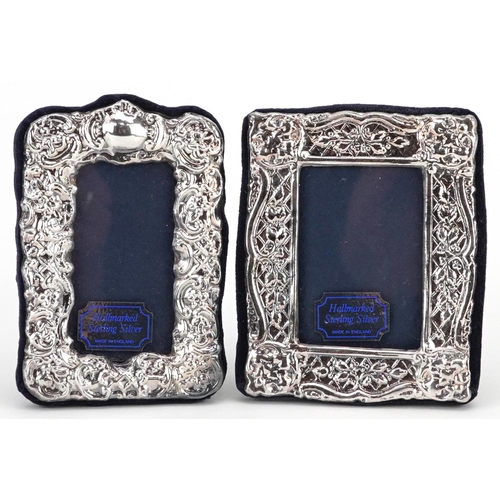 606 - David Richards & Sons, two miniature embossed silver easel photo frames with boxes, Birmingham 1994,... 