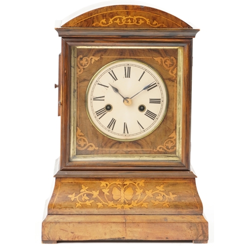 159 - A mid Victorian burr walnut and inlaid mantle clock, the circular dial with Roman numerals, fitted w... 