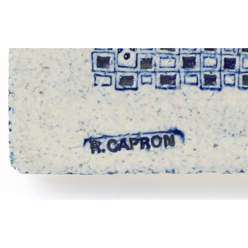 346 - A 20th century ceramic tile plaque by Roger Capron, French, with impressed marks verso, 14cm x 40cm.