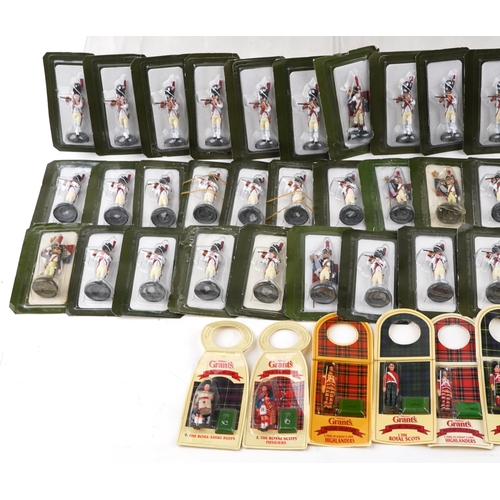 2527 - A large collection of hand painted lead military figures, many in sealed blister packs.