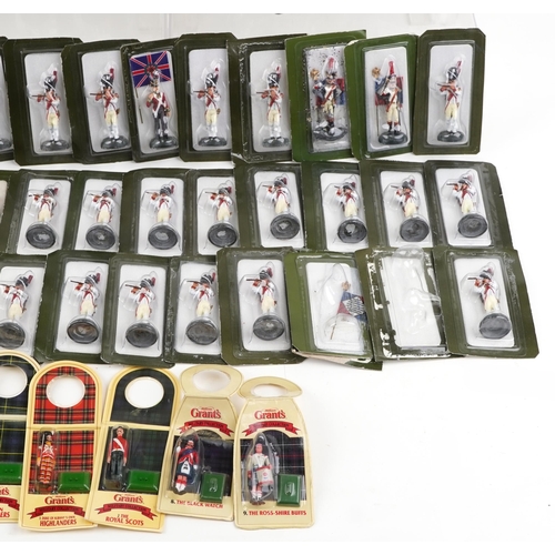 2527 - A large collection of hand painted lead military figures, many in sealed blister packs.