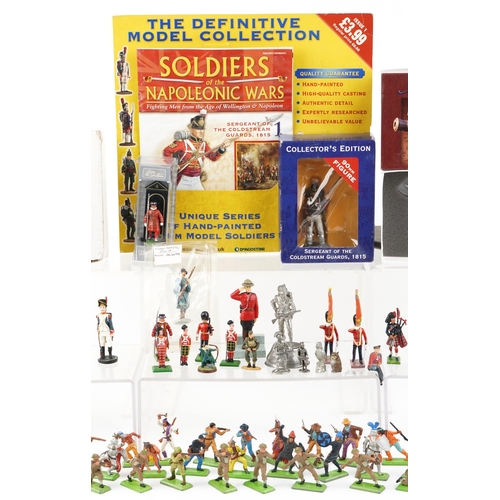 2522 - A collection of vintage and later hand painted lead and plastic military figures including W Britain... 