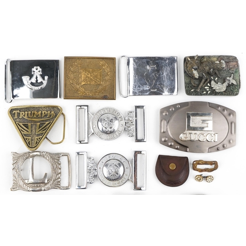 1379 - Vintage and later belt buckles including some military interest.