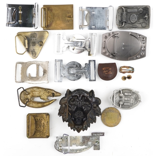 1379 - Vintage and later belt buckles including some military interest.