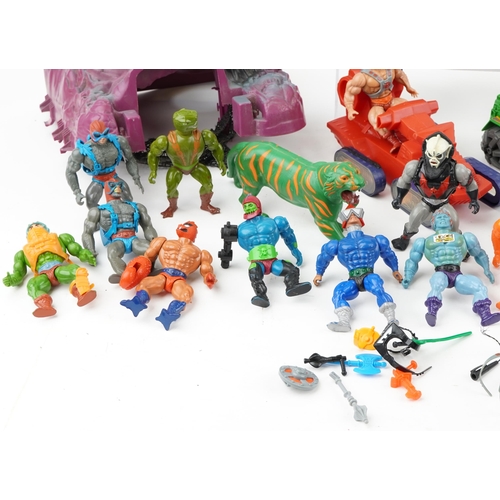 1303 - A collection of vintage He-Man action figures, vehicles and accessories, some by Mattel.