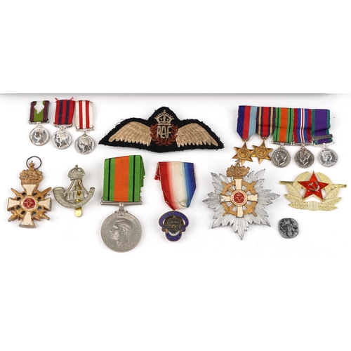 2426 - Militaria including a framed set of World War II medals, badges and Civil Defence Pass number 12 Sou... 