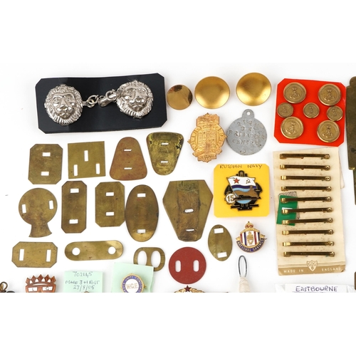 2477 - Militaria including British military issue uniform button cleaning tools, ACME whistles, British Rai... 