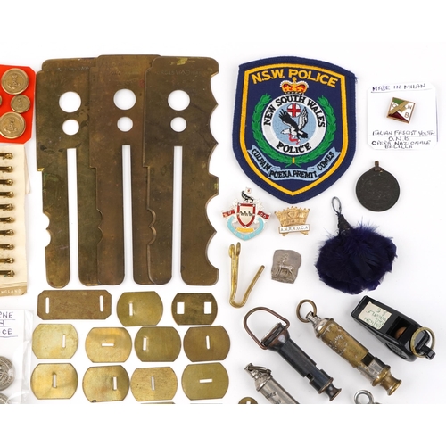 2477 - Militaria including British military issue uniform button cleaning tools, ACME whistles, British Rai... 