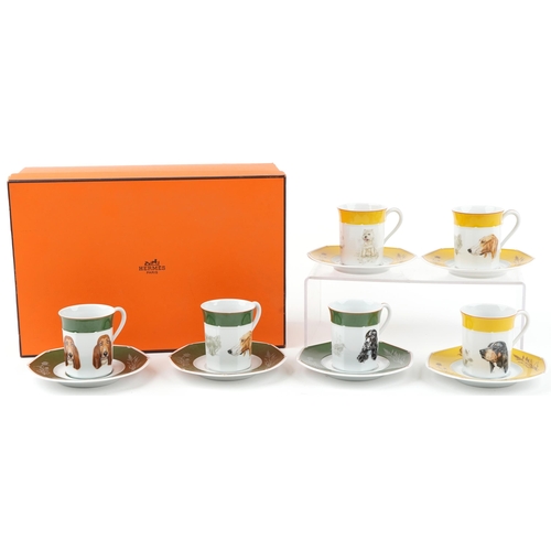 Hermes of Paris, a set of six cups and saucers hand painted with Pointer dogs, the saucers 15.5cm in diameter, with box.