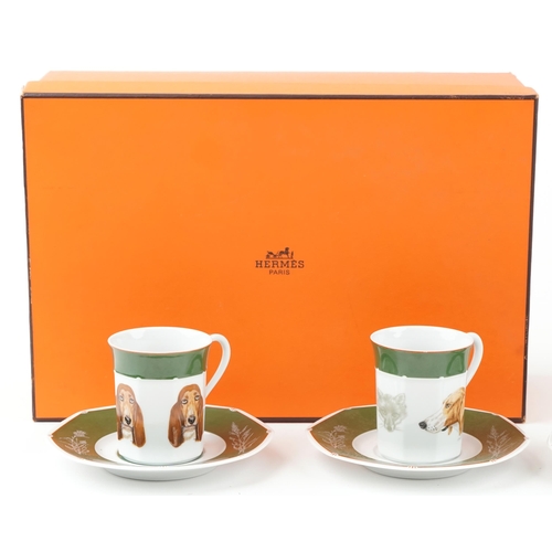  Hermes of Paris, a set of six cups and saucers hand painted with Pointer dogs, the saucers 15.5cm in... 