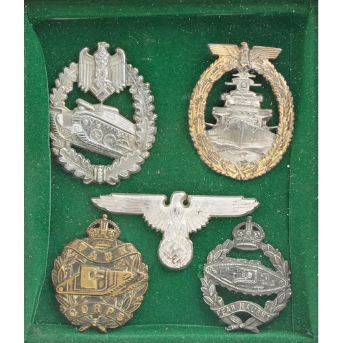 2545 - Five German military interest cap badges, framed and glazed.