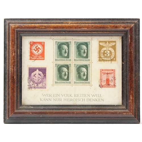 2542 - A collection of German military interest stamps and medals, each framed and glazed.