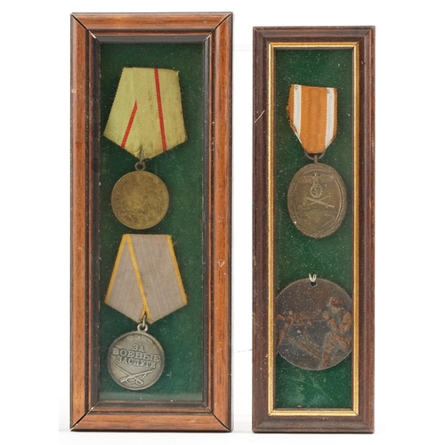 2542 - A collection of German military interest stamps and medals, each framed and glazed.