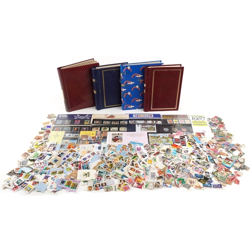 2245 - A large quantity of British decimal presentation packs and loose mint stamps, the majority set in fo... 