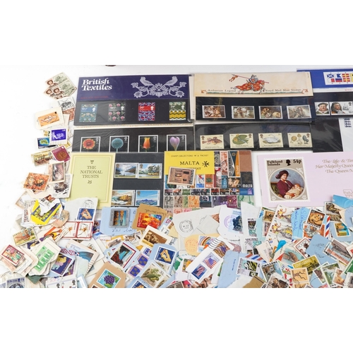 2245 - A large quantity of British decimal presentation packs and loose mint stamps, the majority set in fo... 