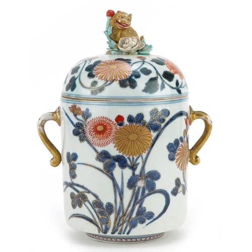  A Japanese Imari porcelain lidded jar, Meiji period, the lid mounted with a temple dog, 23cm high x ... 