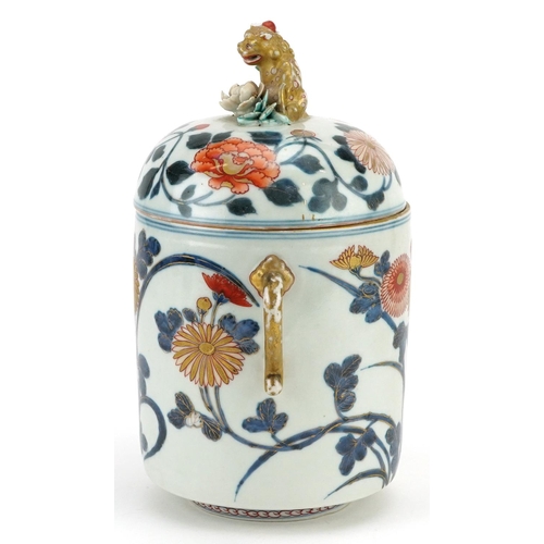  A Japanese Imari porcelain lidded jar, Meiji period, the lid mounted with a temple dog, 23cm high x ... 