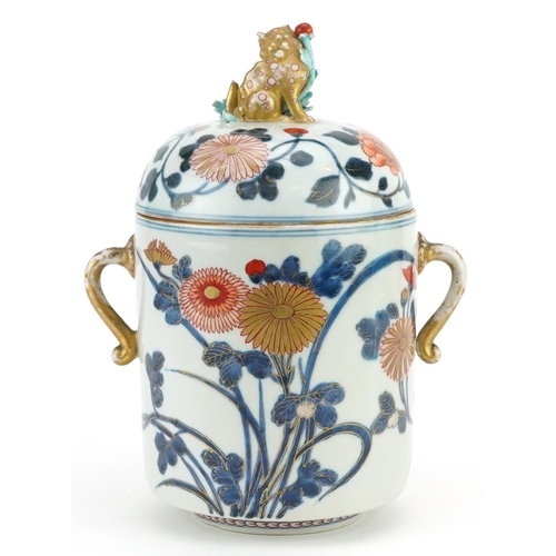  A Japanese Imari porcelain lidded jar, Meiji period, the lid mounted with a temple dog, 23cm high x ... 