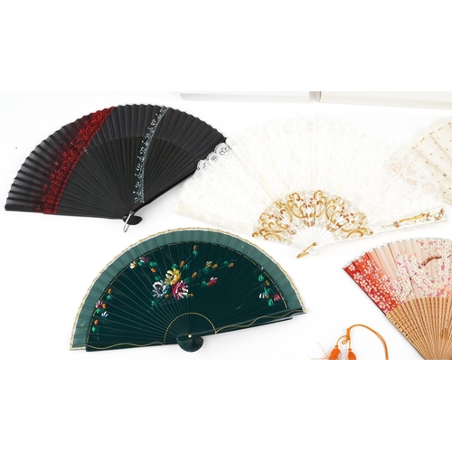 535 - A group of five Chinese hand painted folding fans, 20th century.