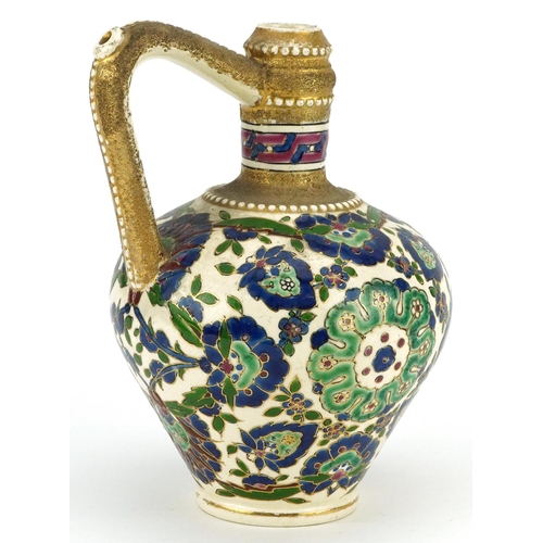 211 - A Fischer J. Budapest hand painted pottery ewer, stamped to the base, 17cm high.