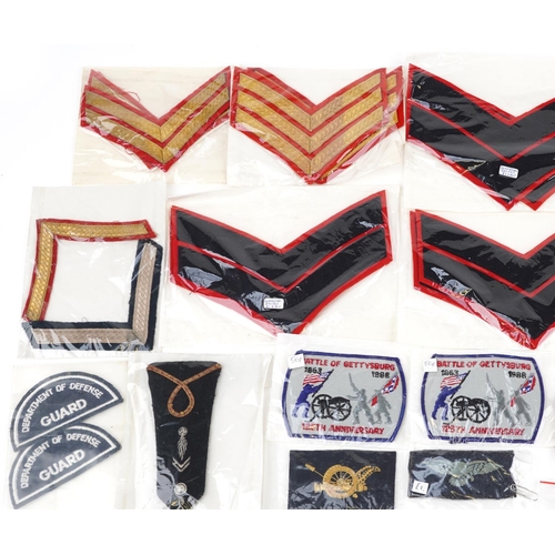 2494 - A large collection of military interest cloth patches and stripes including Naval Air Crew, Observer... 