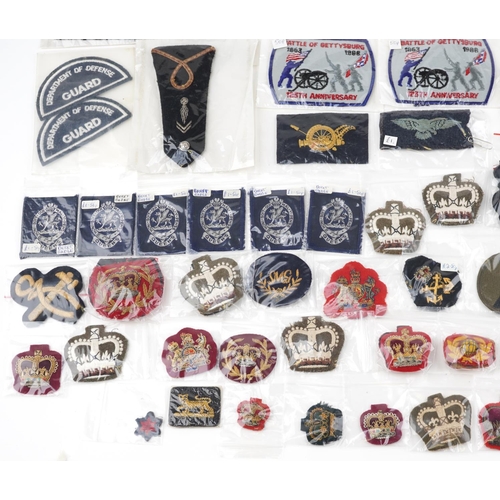 2494 - A large collection of military interest cloth patches and stripes including Naval Air Crew, Observer... 