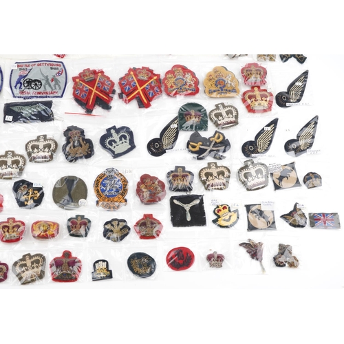 2494 - A large collection of military interest cloth patches and stripes including Naval Air Crew, Observer... 