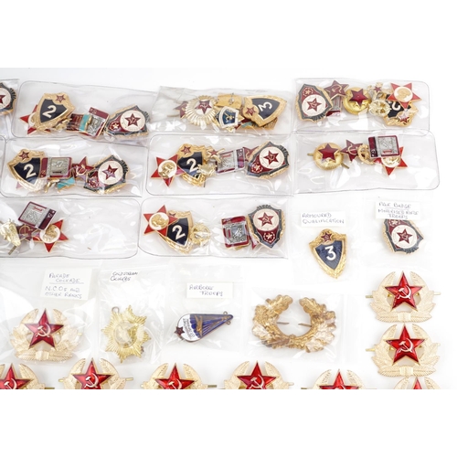 2495 - A large collection of Russian military interest badges including Junior Officers and Warrant Officer... 