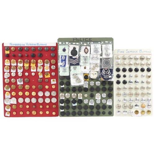 2512 - A collection of military, police and fire service uniform buttons including Royal Engineers, 17th La... 