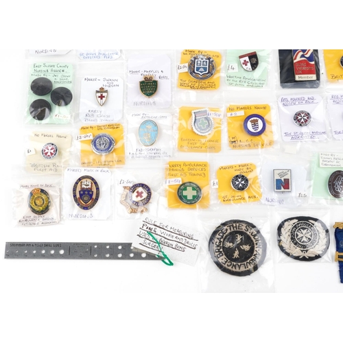 2303 - A collection of nursing related badges, buttons and watches including London County Council Home Nur... 