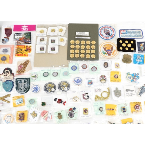 2305 - A large collection of vintage and later badges and buttons, some advertising, including Winnie the P... 