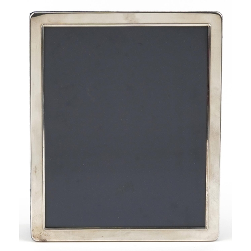 583 - Carrs, large rectangular silver easel photo frame, Sheffield 1995, 28.5cm x 23.5cm.